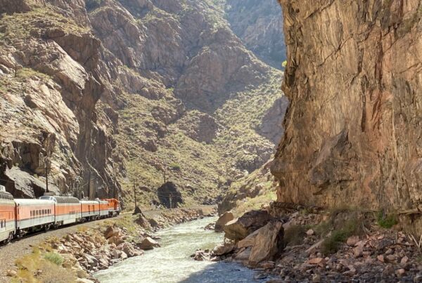 Royal Gorge Railroad driving through a canyon in Colorado